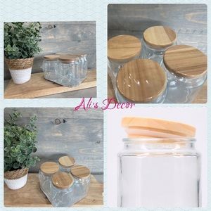 - 4 pack of glass jars with natural wood lids